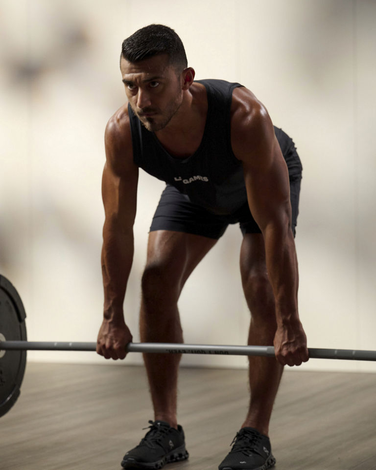a man performing a deadlift