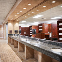 Row of sinks in a locker room at Life Time