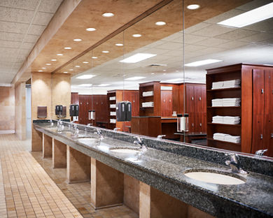 Row of sinks in a locker room at Life Time