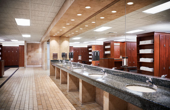 Row of sinks in a locker room at Life Time