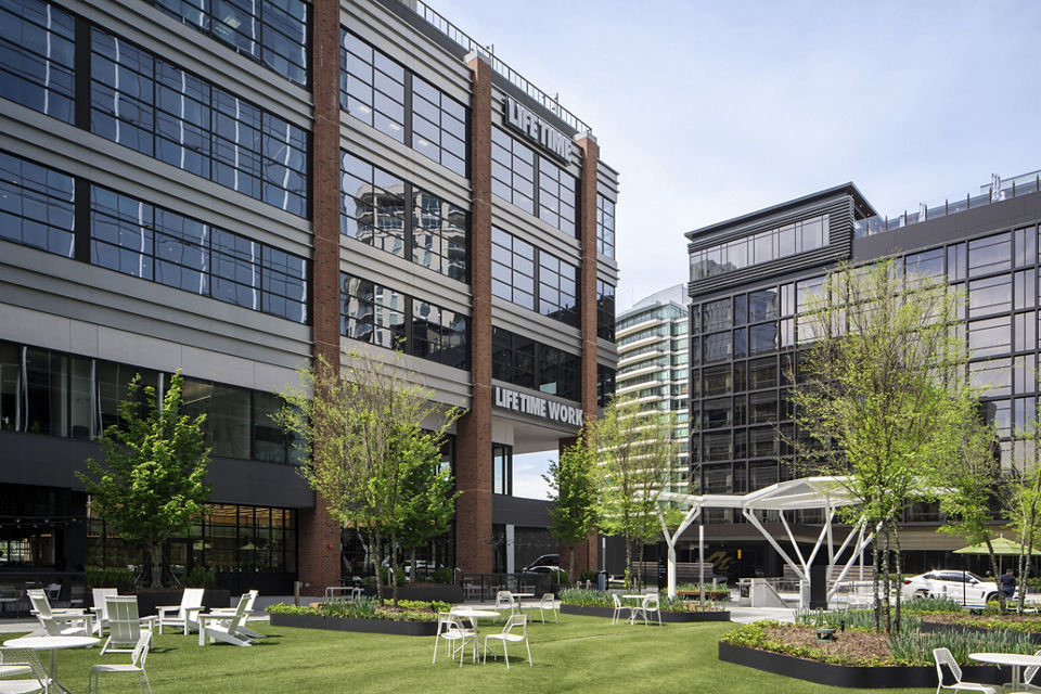 An outdoor space with chairs outside Life Time Buckhead