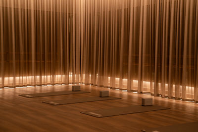 three yoga mats in a yoga studio