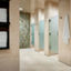 Shower stalls inside a locker room at Life Time