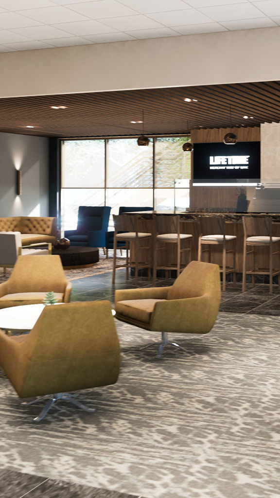 Lounge seating and a bar at Life Time Bloomington North