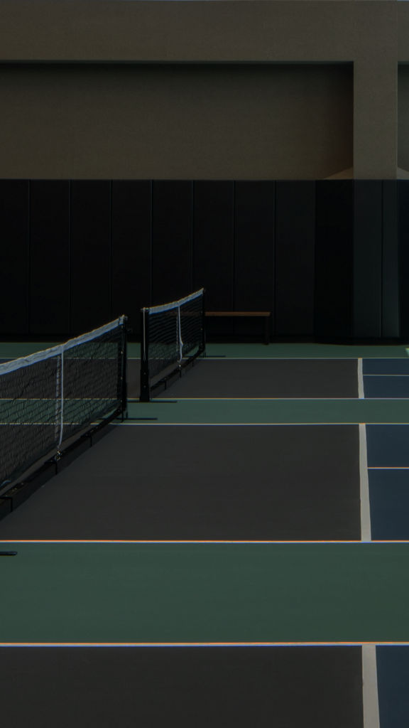 3 indoor pickleball courts in a gymnasium