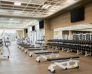 Weight benches on the fitness floor at Life Time