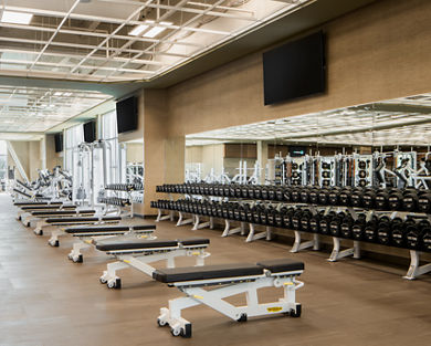 Weight benches on the fitness floor at Life Time