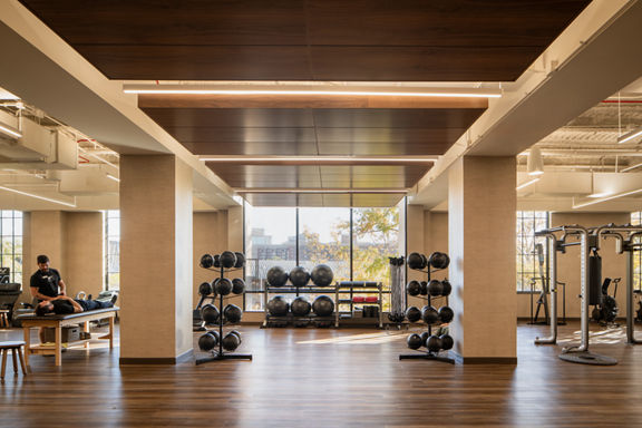 Strength equipment on the fitness floor at Life Time