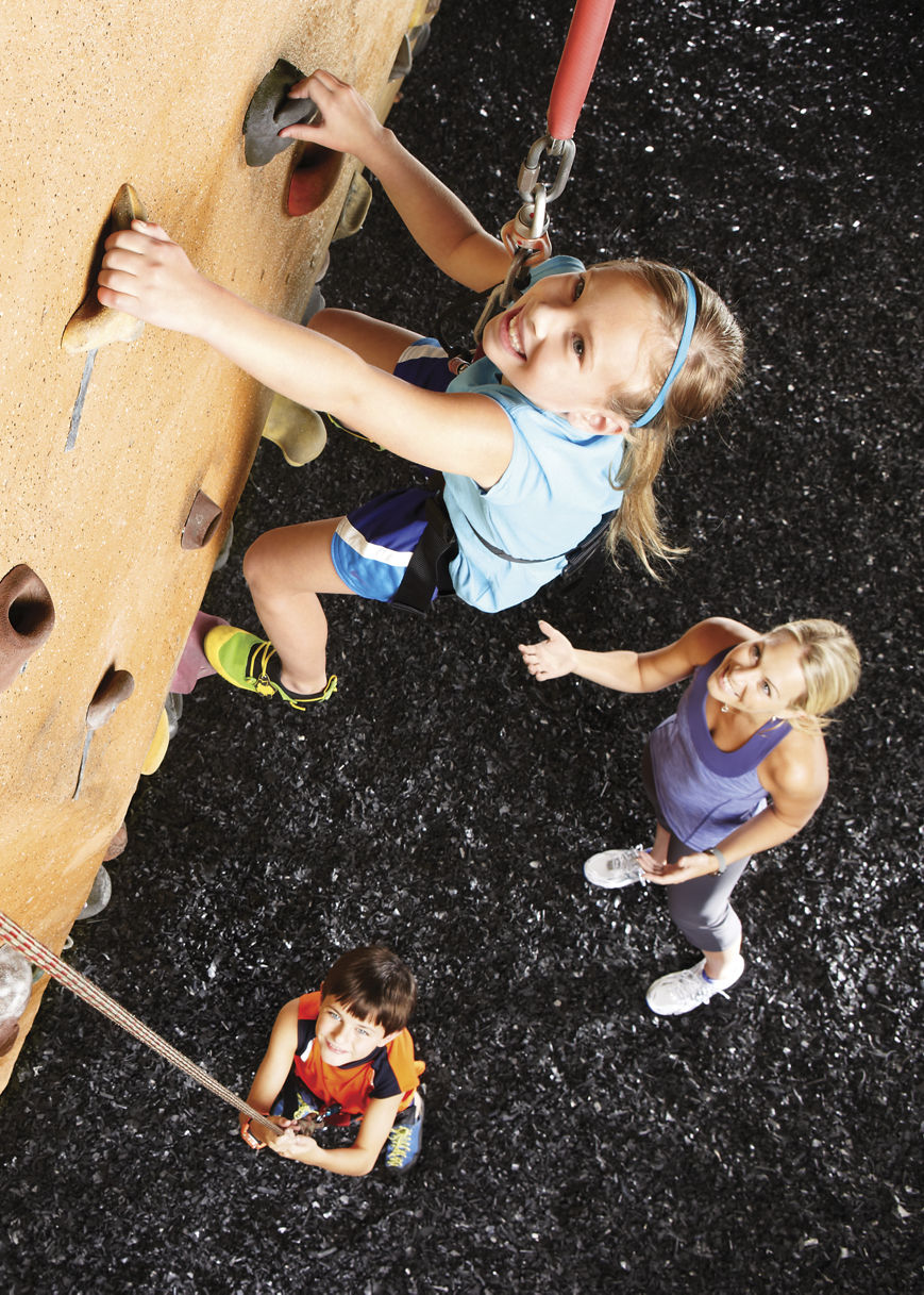 Family spending time on the climb wall.