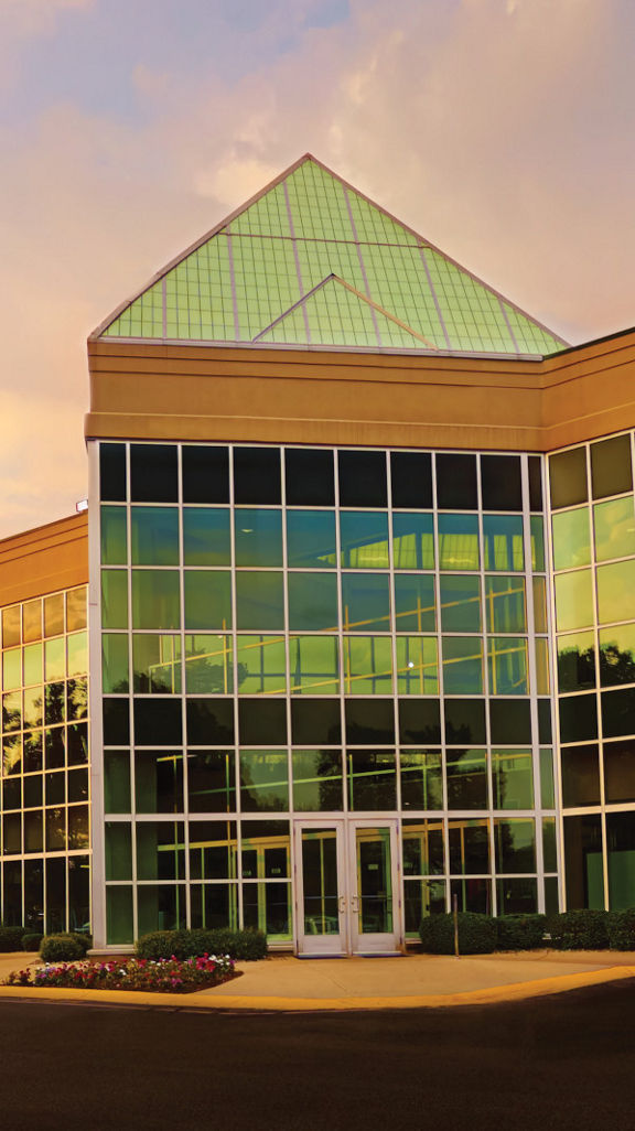 The exterior and front enterance of a Life Time location