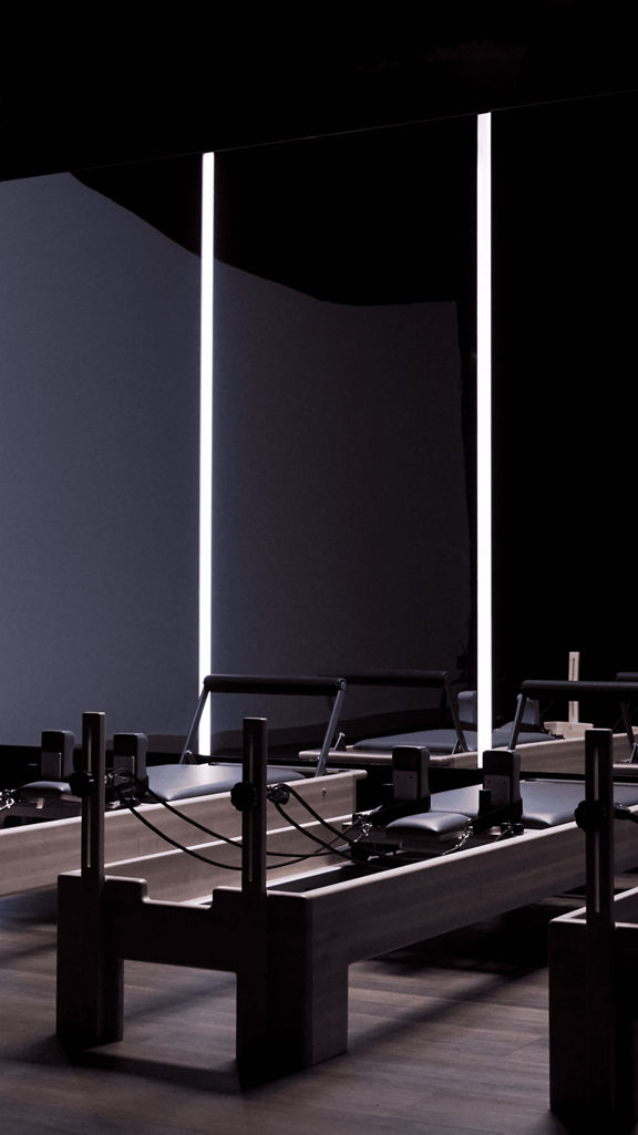 a row of pilates machines