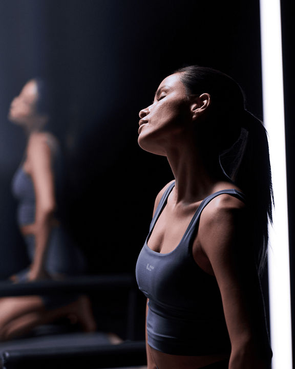 a woman stretching in a CTR class