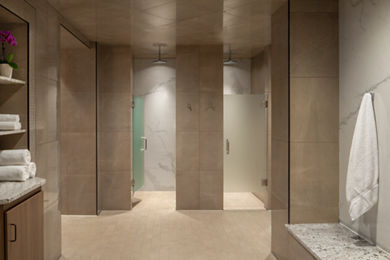 Showers inside the locker room at Life Time