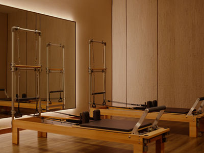 two pilates reformers in a studio