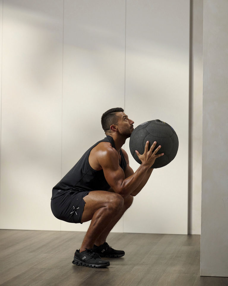 a man doing a wall ball