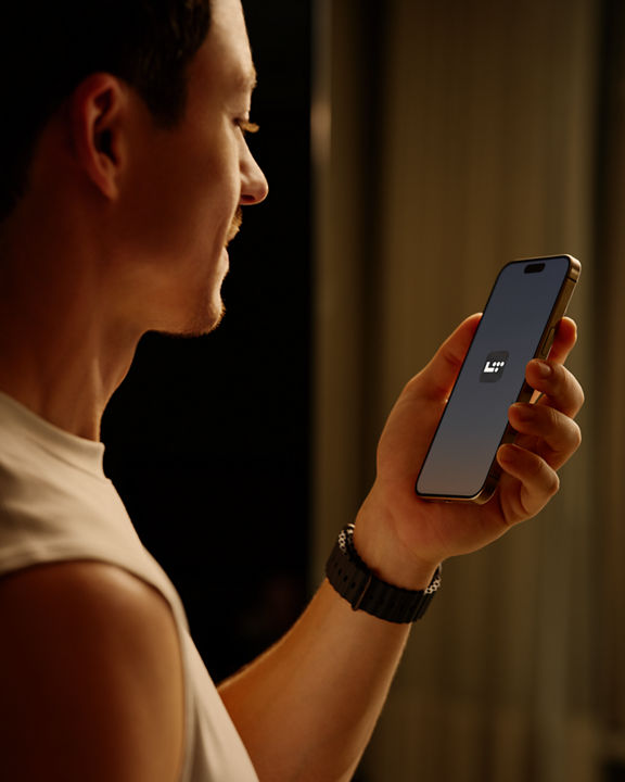 Closeup of a man looking at his phone