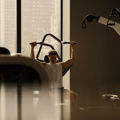 a man using a strength machine