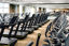 Rows of uniformly placed treadmills on the fitness floor at Life Time