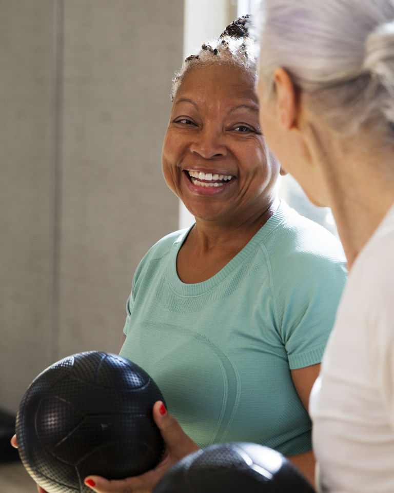 Active-agers participating in a group fitness class.