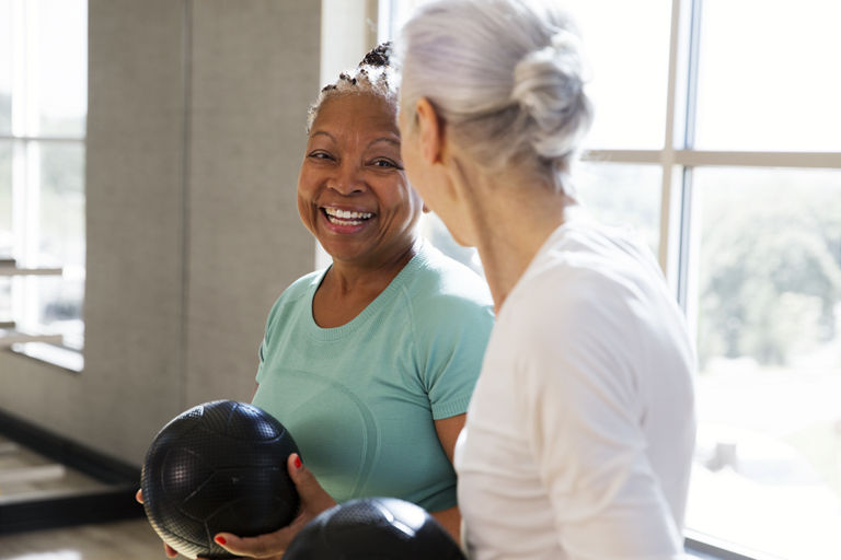 Active-agers participating in a group fitness class.