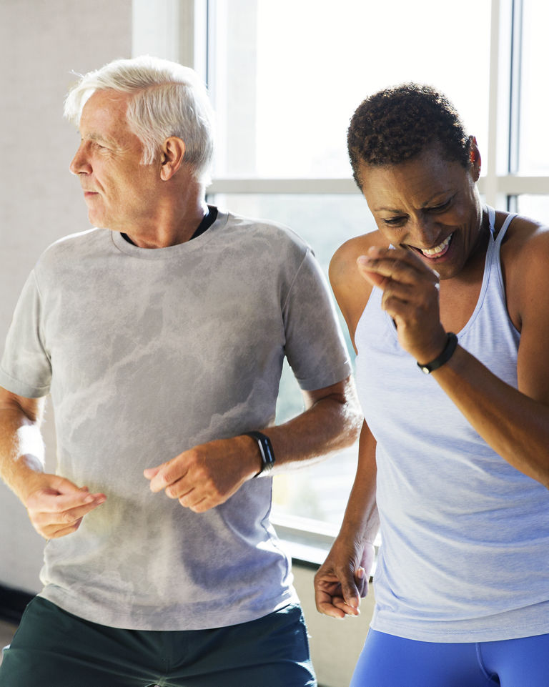 Active-agers participating in a group fitness class.