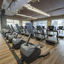 Cardio equipment on the fitness floor at Life Time