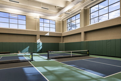 two indoor pickleball courts