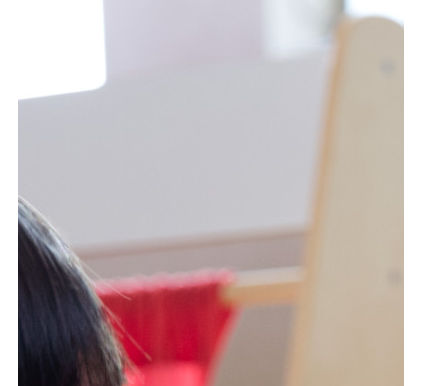 Two girls playing a game with an instructor
