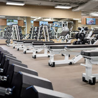 Fitness floor showing weight benches.