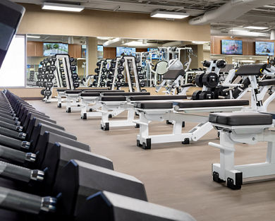 Fitness floor showing weight benches.