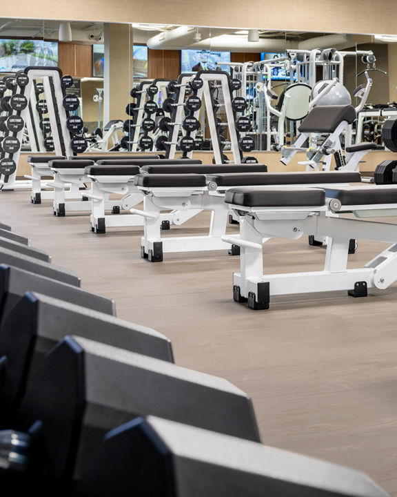 Fitness floor showing weight benches.