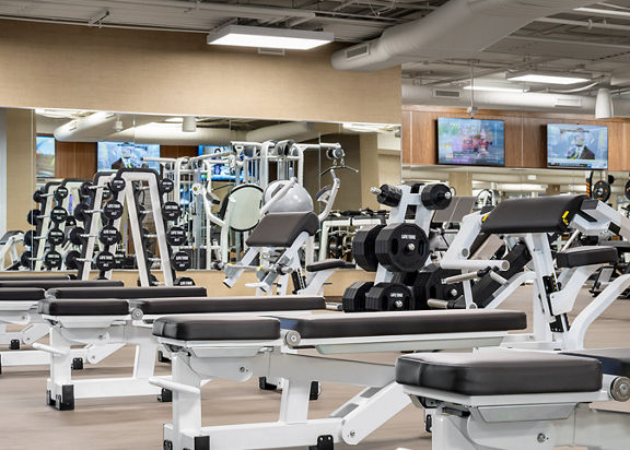 Fitness floor showing weight benches.