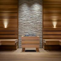 A warm wood and stone sauna interior