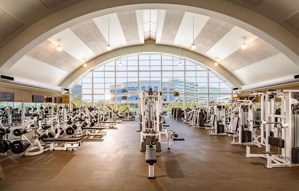 Brightly lit fitness floor at Life Time