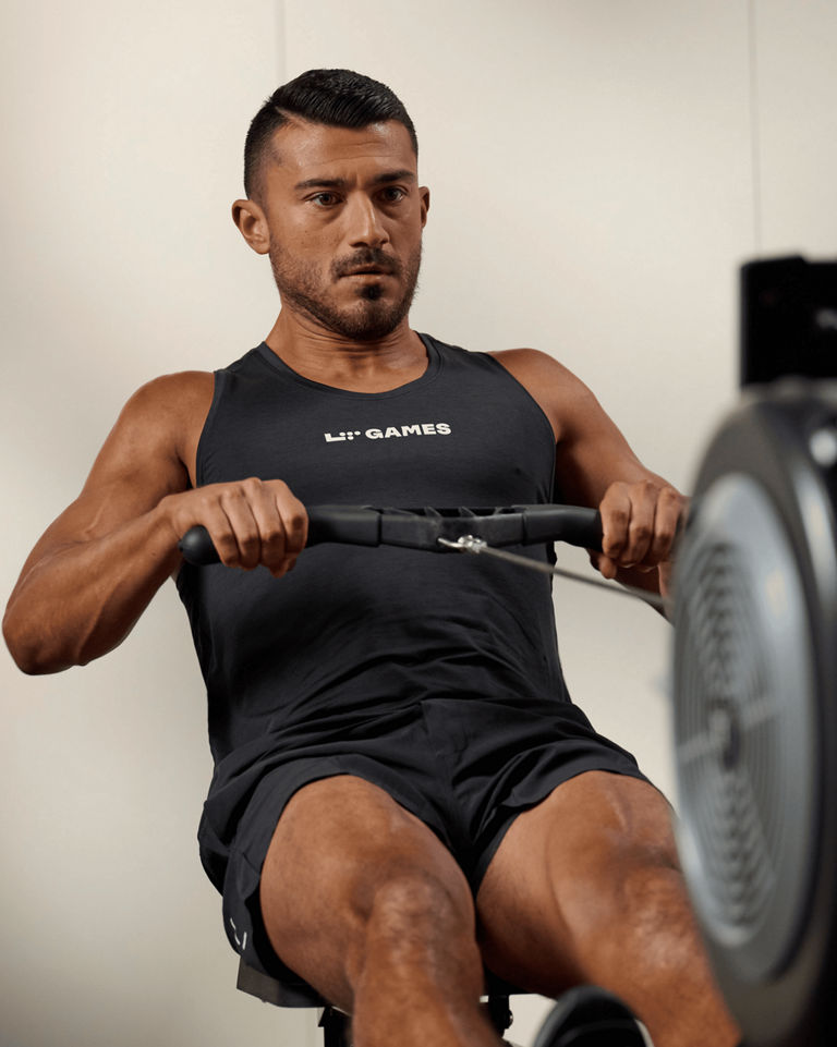 a man on a rowing machine