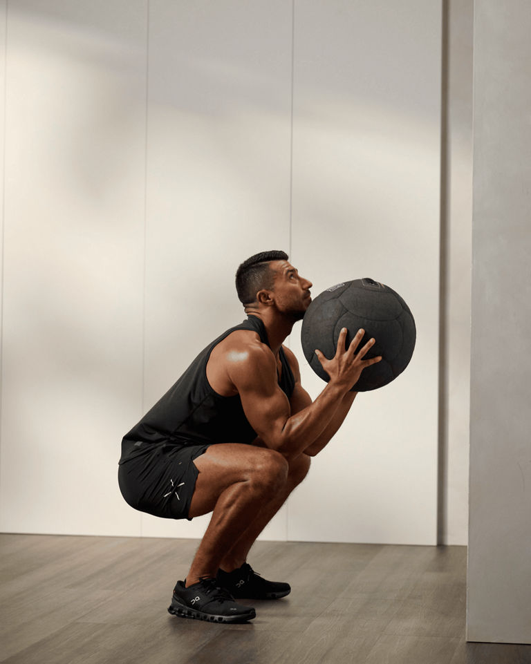 a man doing a wall ball