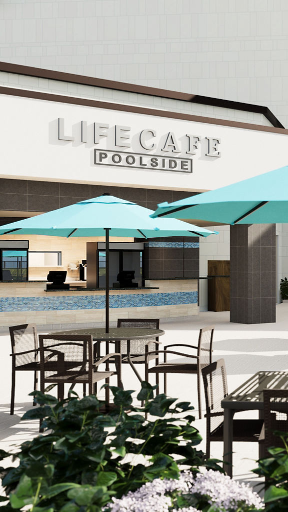 Tables, chairs, and umbrellas at the lifecafe poolside