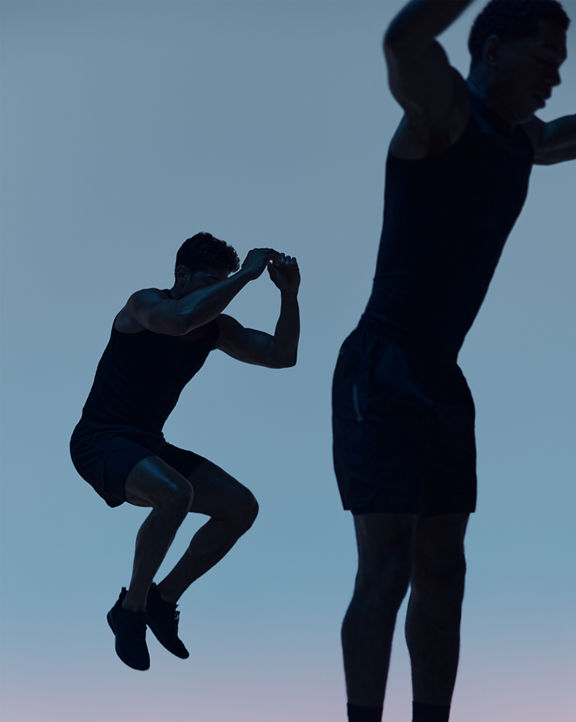 Maxout strength class featuring the silhouette of two people jumping