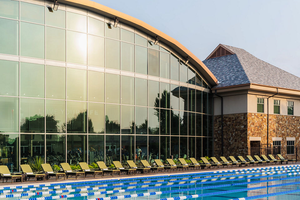 Exterior of the Life Time McKinney at Craig Ranch club location showcasing the large window wall
