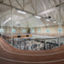 Indoor running track above the fitness floor at Life Time