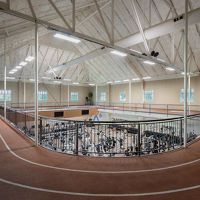 Indoor running track above the fitness floor at Life Time
