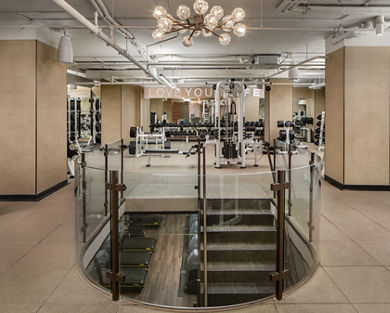 Strength machines on a fitness floor at Life Time