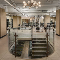 Strength machines on a fitness floor at Life Time