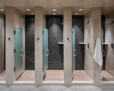 Open shower stalls at Life Time