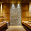 Brightly lit wooden and tiled sauna at Life Time