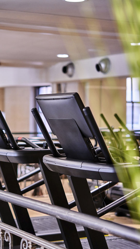 Closeup of treadmills on the Fitness floor at the Life Time NoHo club location