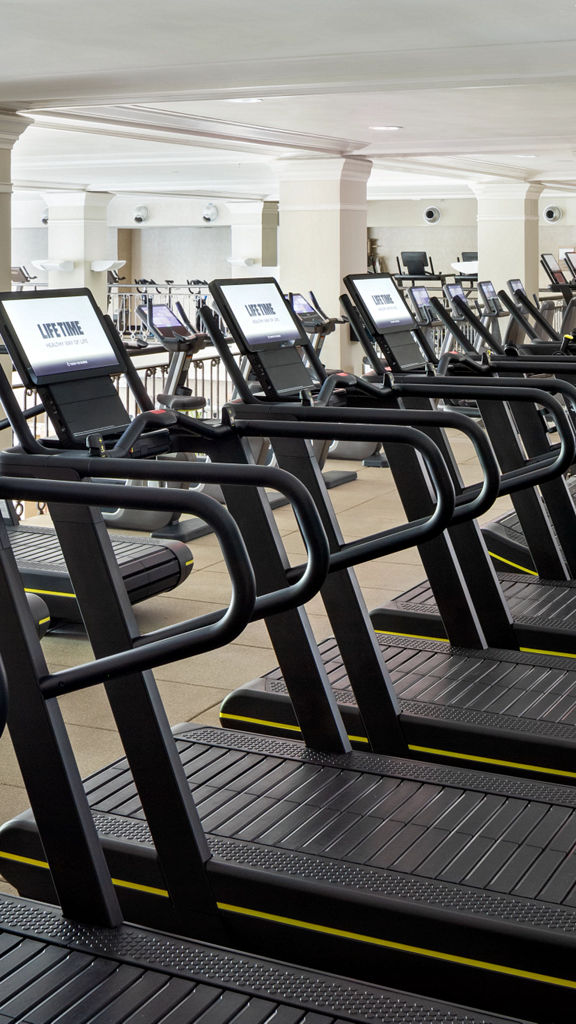 Treadmills on the fitness floor at the Life Time NoHo club location