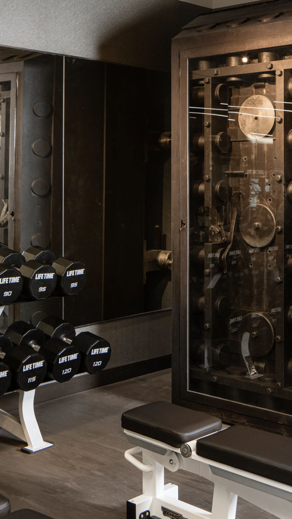 A large steel mechanical safe on the fitness floor at One Wall Life Time club location