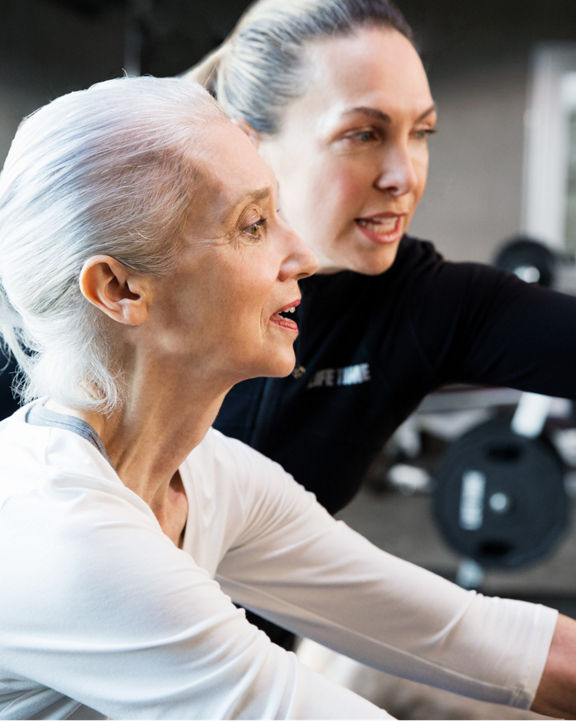 Trainer giving instructions during a personal training session