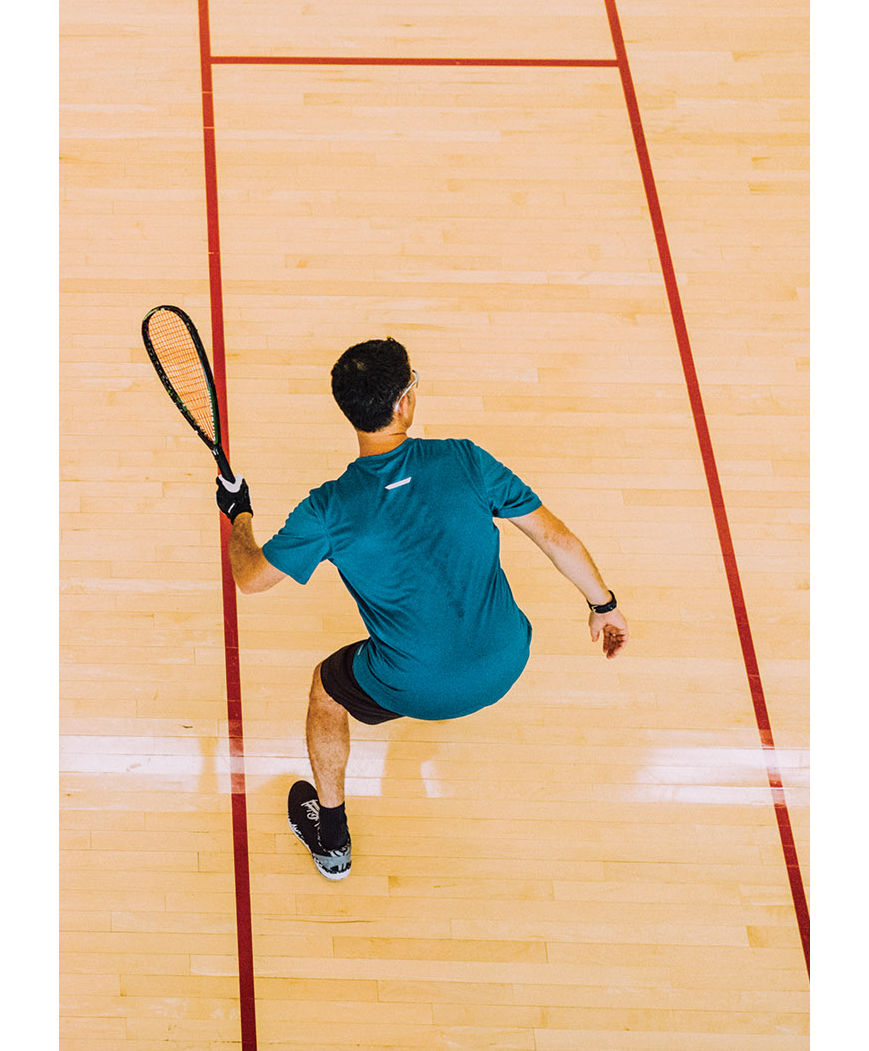 An aerial view of a man playing squash